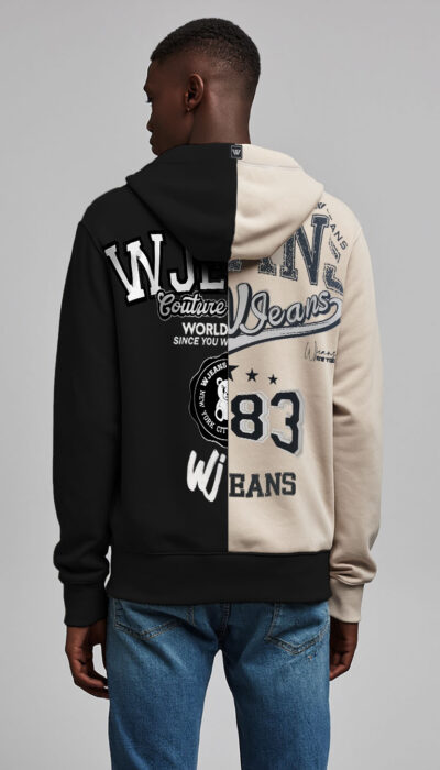 קפוצ’ון דו-צבעי שחור-חול מבית W JEANS עם גרפיקות גדולות בגב ולוגו בחזית.